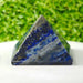 Premium_lapis_lazuli_crystal_pyramid_close-up_texture