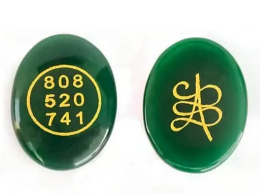 Zibu coin with engraved symbols for prosperity and abundance