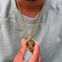 gold hanuman locket for men spiritual jewellery close-up