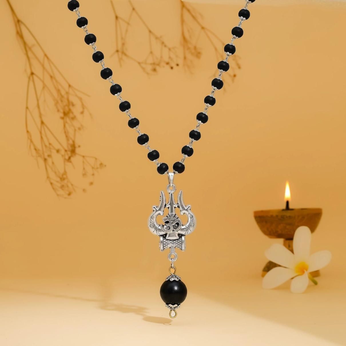 om shiva trishool karungali mala divine protection beads close-up view