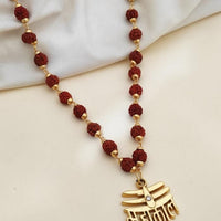 rudraksha mala with shiv locket in gold close-up view